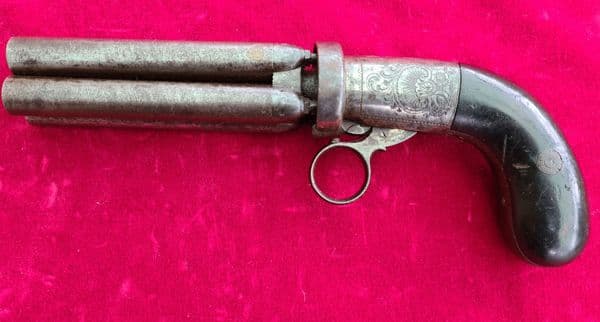An under-hammer 4 barrel Mariette ring-trigger Percussion pepperbox revolver. C. 1840. Ref 7792.